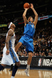 Dallas Mavericks v Denver Nuggets  Denver  CO - February 10: Dirk Nowitzki and Carmelo Anthony