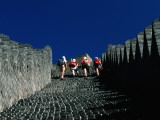 Hikers Climbing the Ancient Great Wall of China