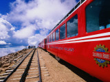 Pikes Peak Cog Railway Train with Visitors Looking Out from Pikes Peak