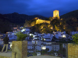 Tourist Taking Picture from Pintor Zabaleta Balcony of La Yedra Castle Illuminated at Night