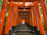 Traditional Torii with Inscriptions at Fushimi Inari Shrine