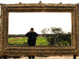 Man Taking Photo Inside Giant Frame Overlooking Werribee Open Range Zoo
