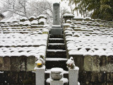 Graveyard with Headstones Covered with Snow