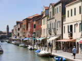 Colourful Houses and Businesses Lining Waterway