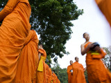 Buddhist Monks on their Morning Walk to Collect Food