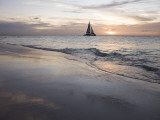 Catamaran at Sunset Seen from Bucuti Beach Resort on Eagle Beach
