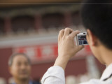 Tourist Taking Photo at Heavenly Gate
