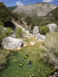 Group of Friends Practising Canyoning in Guadalquivir River
