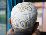 Man Wearing Arabic Cap