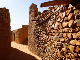 Narrow Alleyway Through Ruins of Desert Town