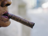 Profile of Cuban Woman Smoking Cigar in Vieja District