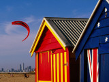 Beach Huts with Kitesurfer and City Skyline in the Background  Brighton