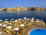 Valletta Skyline with Tourists Relaxing around Pool in Foreground