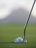 Golf Club and Ball on Green at Le Touessrok Golf Course