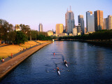 Rowers on Yarra River with City Skyscrapers in Background