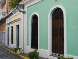 Colourful Buildings Lining Cobblestone Street