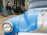 Vintage Car and Cuban Men Playing Domino Game on Marti Street