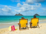 Couple Relaxing on Beach at Lanikai on Windward Side of Oahu