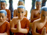 Statuettes of Buddhist Monks at Prayer
