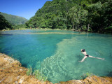 Visitors Swimming in Turquoise-Coloured Waters of Semuc Champey