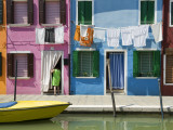 Boats and Colourful Houses Along Canal