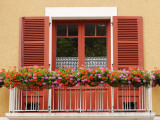 Pots of Geranium Flowers on Window Balcony