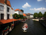 Tourists Taking Boat Tour in Canal