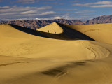 Hikers at Mesquite Flat Sand Dunes with Amargosa Range in Background