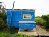 Decorated Bathroom with Outdoor Sink and Mirror