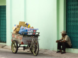 Garbage Collector Taking a Break in Small Sidestreet