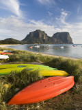 Canoes and Kayaks Lining Lagoon Beach with Mt Gower and Mt Lidgbird in Distance