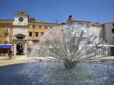 Dandelion Fountain in Frane Petrica Square (Trg Frane Petrica) with City Clock Beyond
