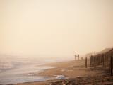 Fishermen on Beach at Sunrise