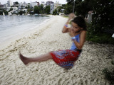 Young Girl Swinging on a Rope  Seven Shillings Beach
