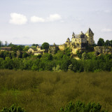 Chateau De Montfort with Grove of Walnut Trees in Foreground