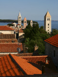 Historic Centre of Rab Town with Rooftops and Four Bell Towers