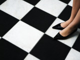 Solis Theatre Tour Guide Shoes Standing on the Theatre's Marble Floor