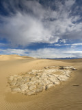 Huge Cumulus Cloud over Eroded and Cracked Clay Formation at Mesquite Flat Sand Dunes