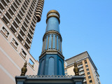 Minaret of Saigon Mosque in Front of High-Rise Buildings