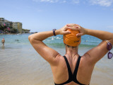 Woman Preparing for Ocean Swim at Bondi Beach