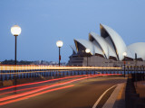 Light Trailing under Harbour Bridge with Sydney Opera House Beyond