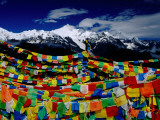 Meilixueshan (Also known as Meili Xueshan) Mountain Range and Buddhist Prayer Flags