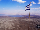 The Blue and White Flag of Israel  the Star of David Flies over the Deserts of Masad