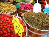 Barrels of Olives for Sale at Market Stall Along Bellini Street