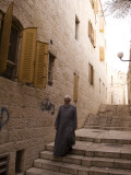 Man Walking Down Stairs in Old Jerusalem