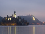 Baroque Church of Assumption on Bled Island with Renaissance Bled Castle