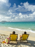 Couple Relaxing on Beach at Lanikai on Windward Side of Oahu