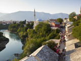 People on Kujundziluk in Old Town  Koski Mehmed Pasa Mosque and Neretva River