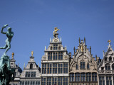 Statue of Brabo Fountain in Grote Markt (Town Square) with Guilds Houses in Background