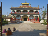 Beggar Women Waiting in Front of Tibetan Temple and Monastery